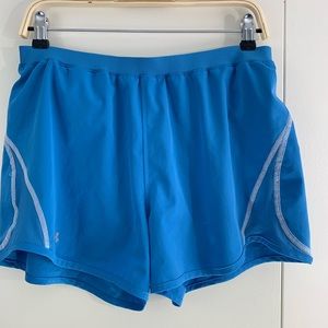 Under Armour L blue running shorts